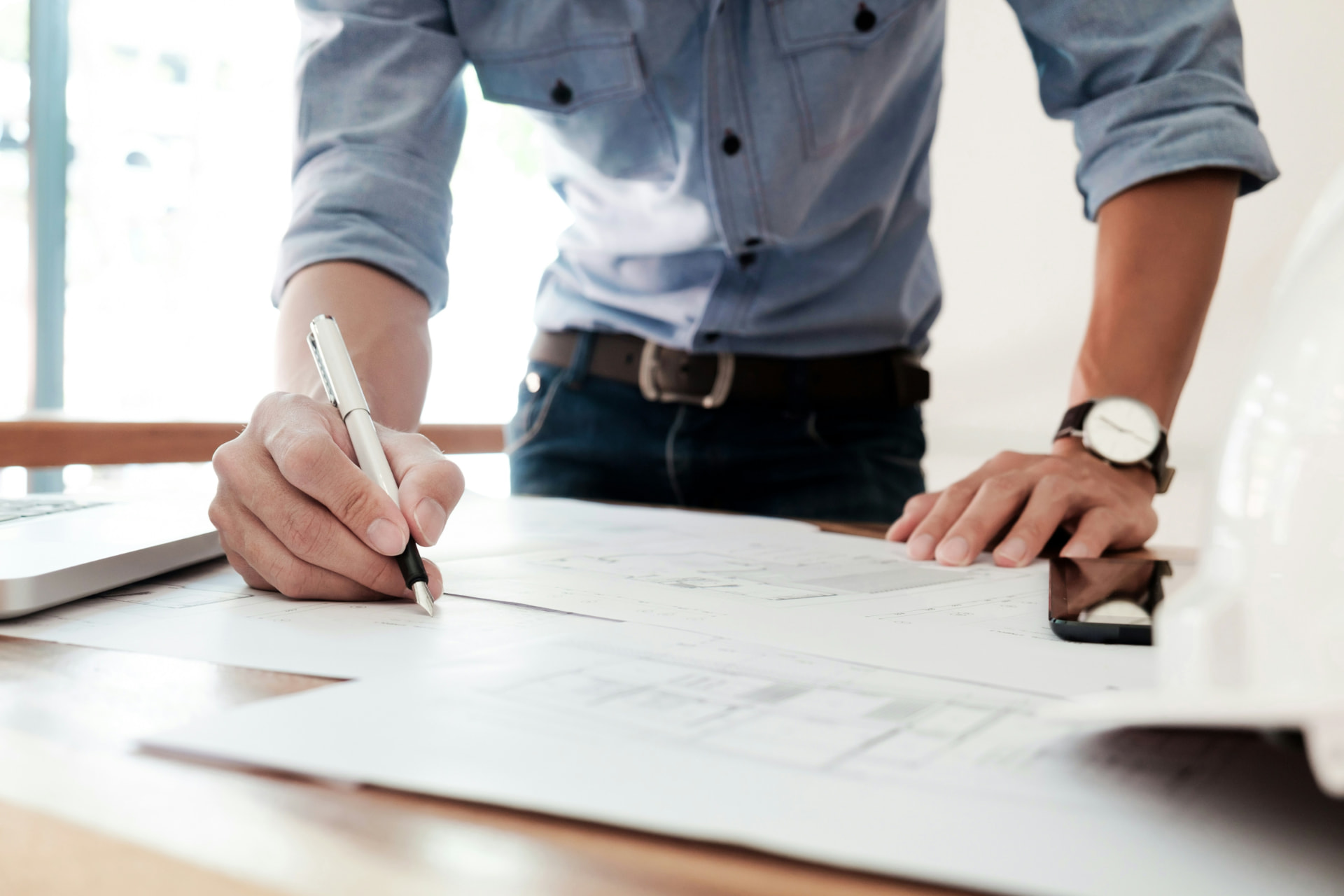 Illustration of a construction team reviewing project requirements