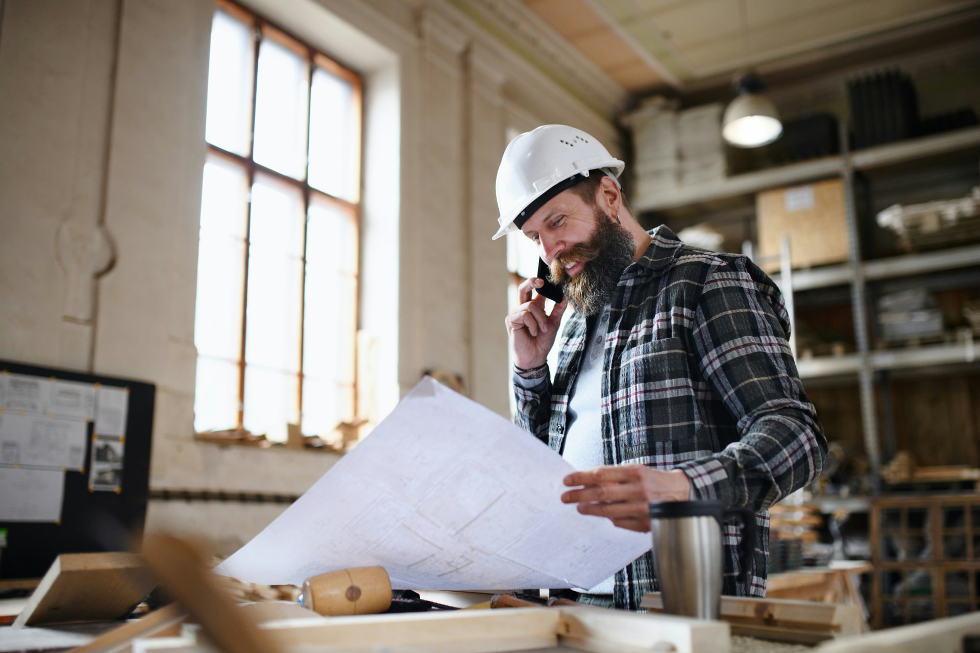 General contractor reviewing project plans